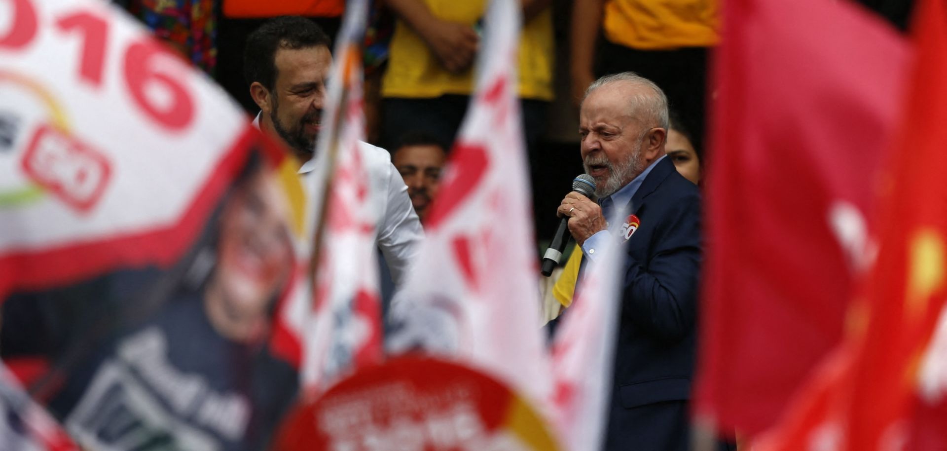 Brazilian President Luiz Inacio Lula da Silva speaks during a rally supporting Sao Paulo mayoral candidate Guilherme Boulos (L) on Aug. 24 in Sao Paulo, Brazil.