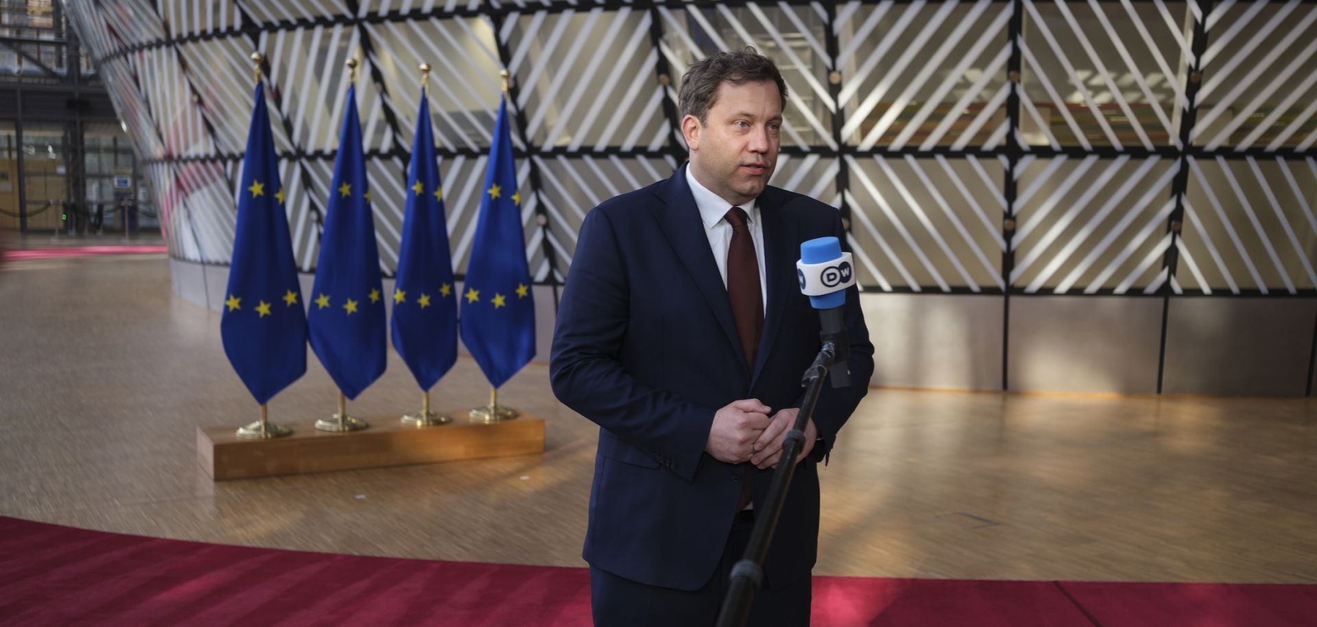 German Finance Minister Lars Klingbeil talks to the media before the start of an Eurogroup ministers meeting at the EU headquarters in Brussels, Belgium, on March 9, 2026. 