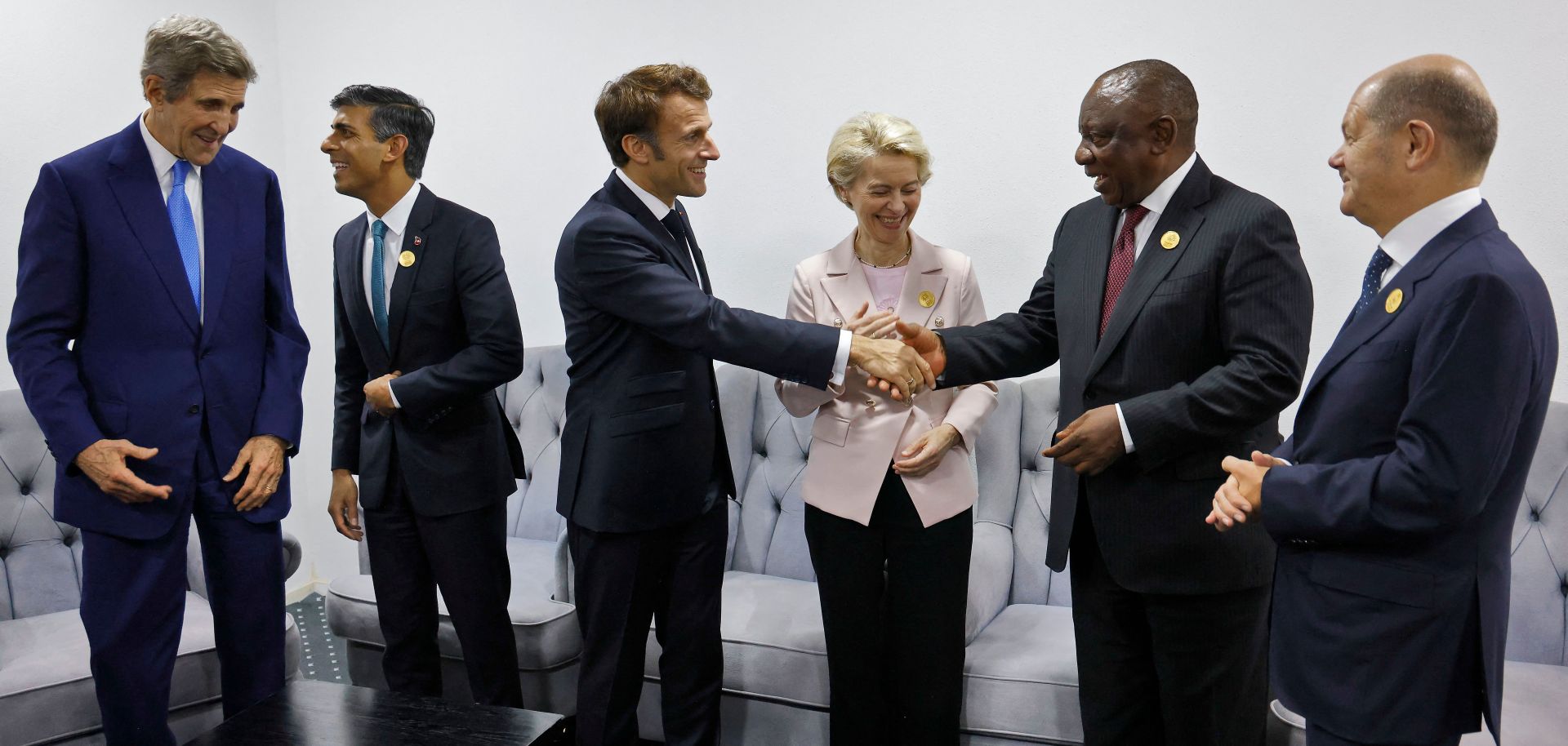 (From left to right) U.S. Special Presidential Envoy for Climate John Kerry, U.K. Prime Minister Rishi Sunak, French President Emmanuel Macron, European Commission President Ursula von der Leyen, South African President Cyril Ramaphosa and German Chancellor Olaf Scholz meet on the sidelines of the COP27 climate summit in Egypt on Nov. 7, 2022. 