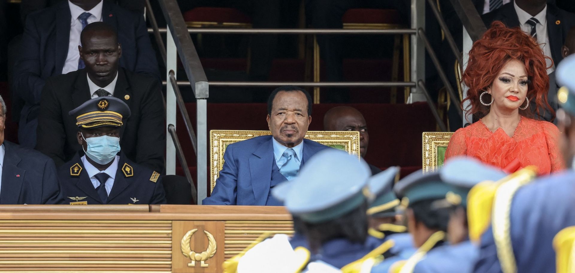 Cameroonian President Paul Biya (left), and his wife Chantal Biya (left) watch a parade marking the 51st celebration of Unity Day in Yaounde on May 20, 2023. 