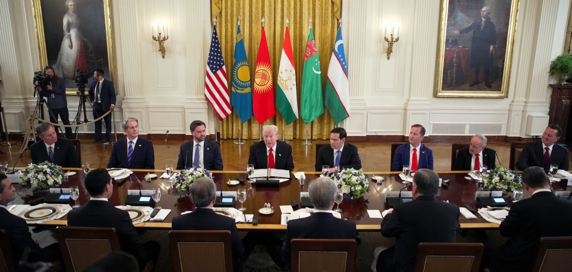 U.S. President Donald Trump (C), joined by lawmakers and members of his administration, delivers remarks during a dinner with leaders of Central Asian countries in the East Room of the White House on Nov. 6, 2025.