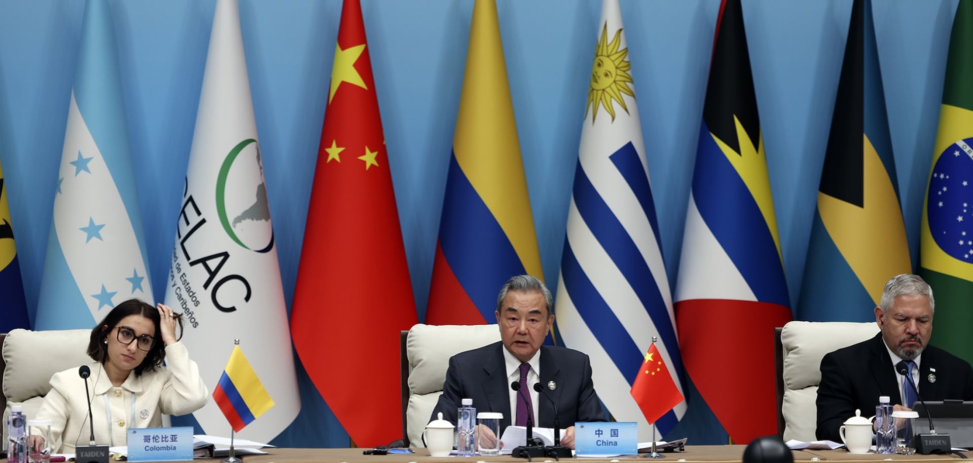 (L-R) Colombian Foreign Minister Laura Sarabia, Chinese Foreign Minister Wang Yi and Honduran Foreign Minister Eduardo Enrique Reina attend a plenary session of the China-CELAC ministerial meeting at the Great Hall of the People on May 13, 2025, in Beijing, China. 