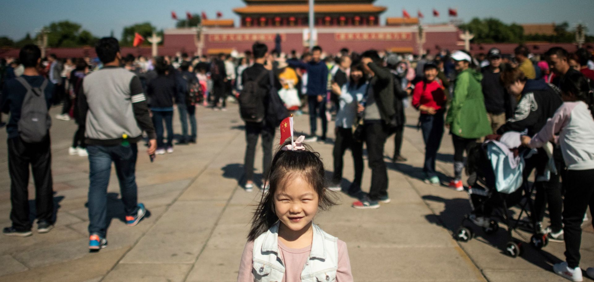 A girl stands in Tiananmen Square during National Day in Beijing, China, on Oct. 1, 2018. 