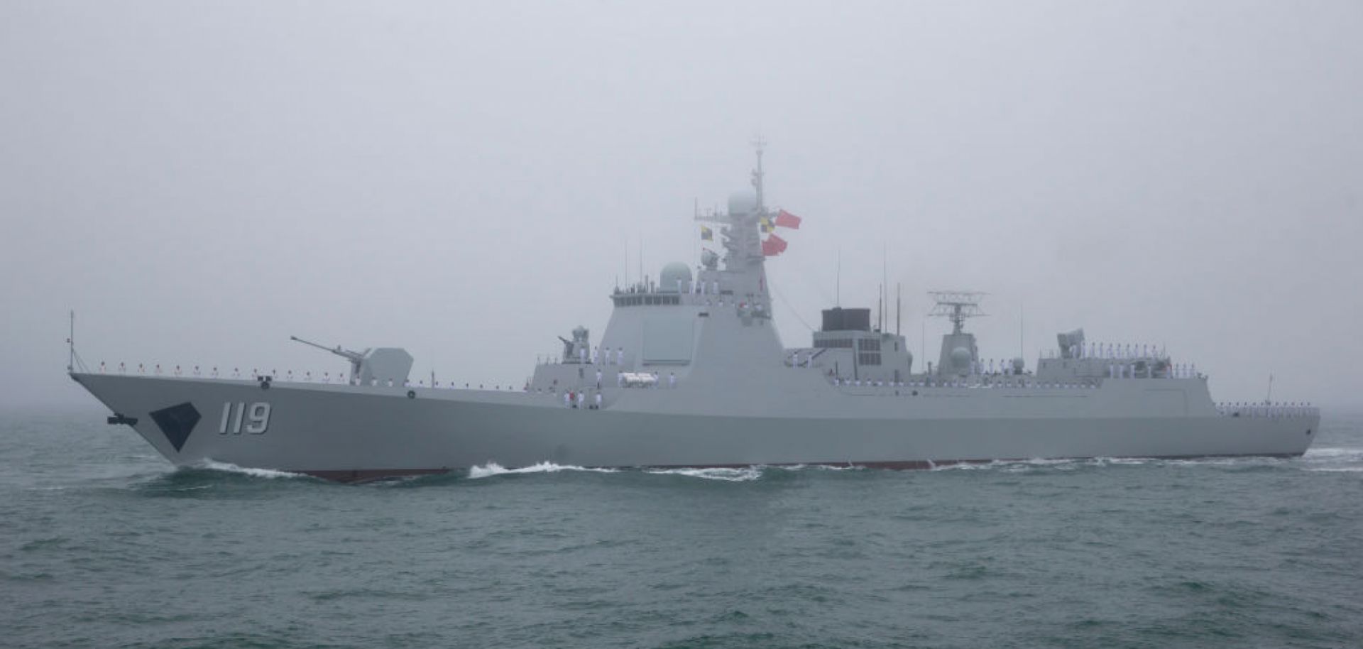 A Chinese frigate participates in a naval parade in the sea near Qingdao, in eastern China's Shandong province, on April 23, 2019. 