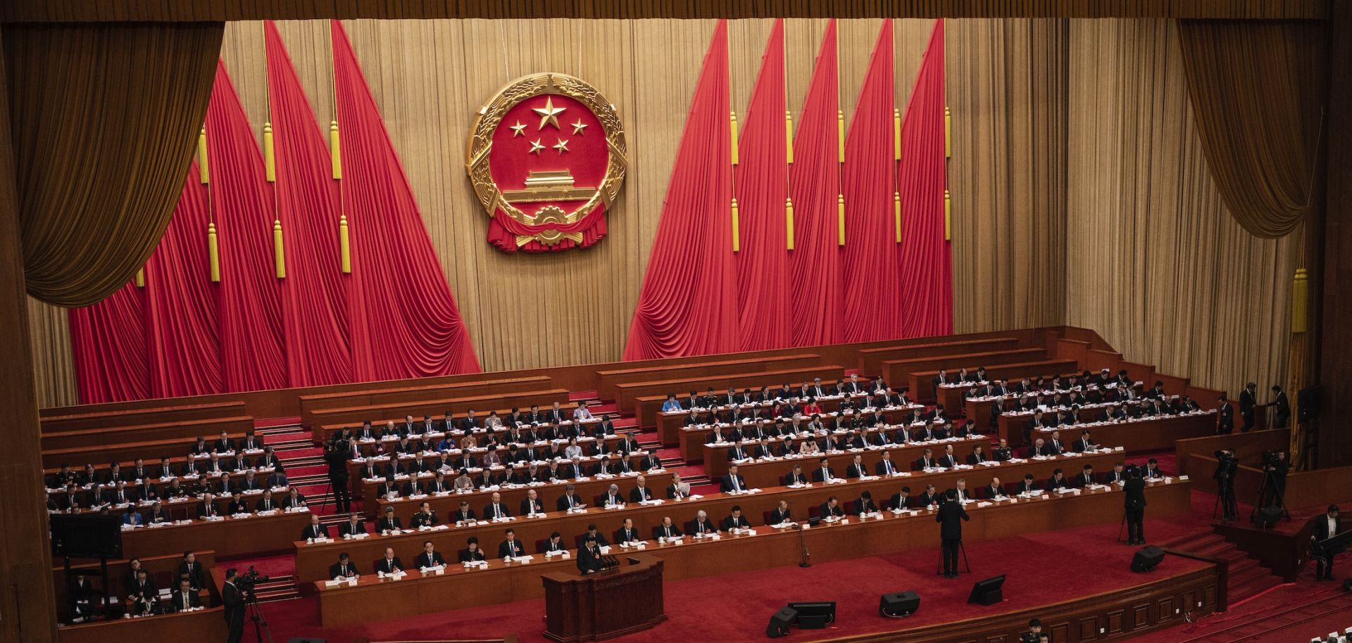 Chinese President Xi Jinping, center, and other senior government members and deputies attend the second plenary session of the National People's Congress at the Great Hall of the People on March 8, 2025, in Beijing, China.