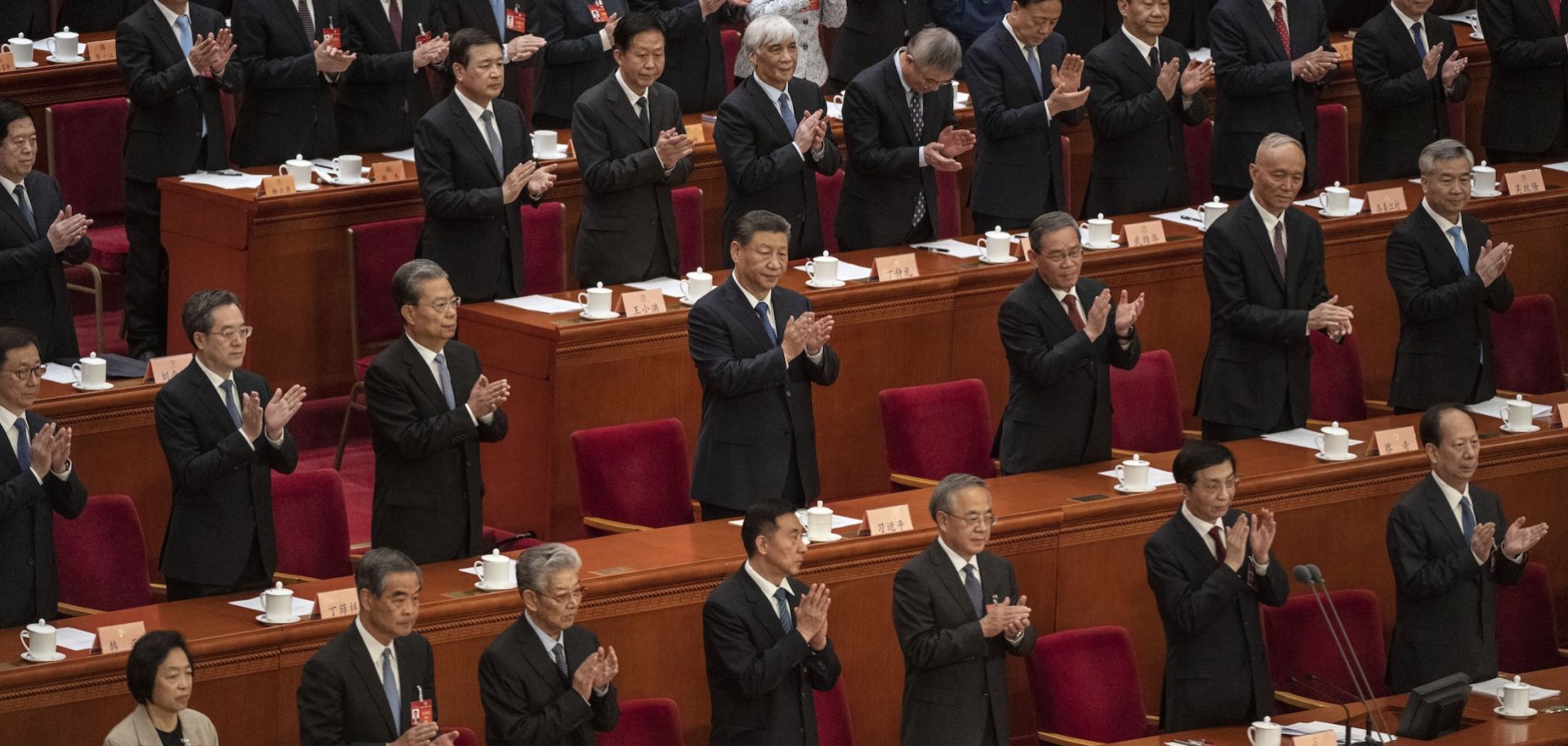 Chinese President Xi Jinping (center) and other senior leaders applaud at the closing session of the Chinese People's Political Consultative Conference, or CPPCC, on March 10, 2024, in Beijing, China. 