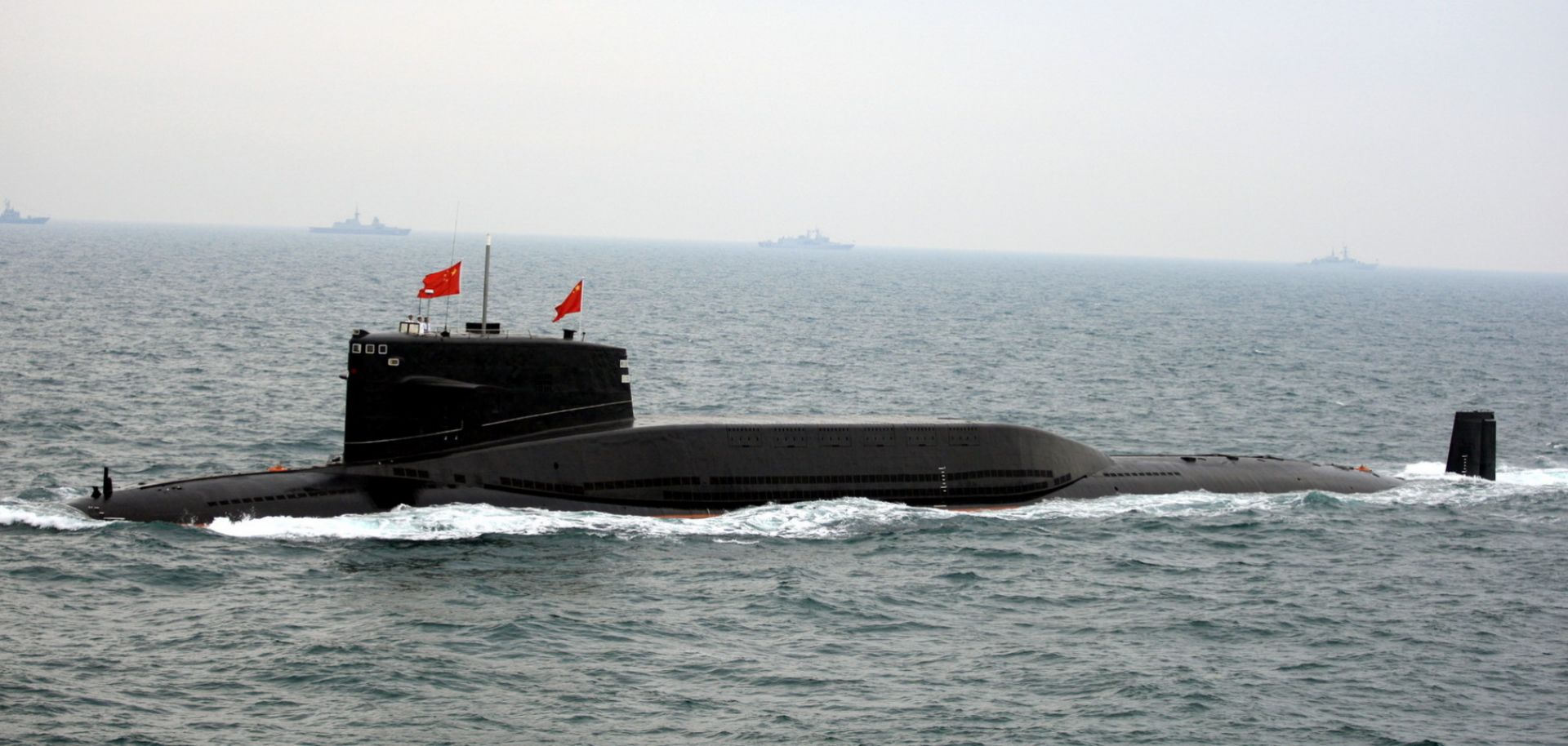  Chinese Navy submarine participates in an international fleet review to celebrate the 60th anniversary of the founding of the People's Liberation Army Navy.