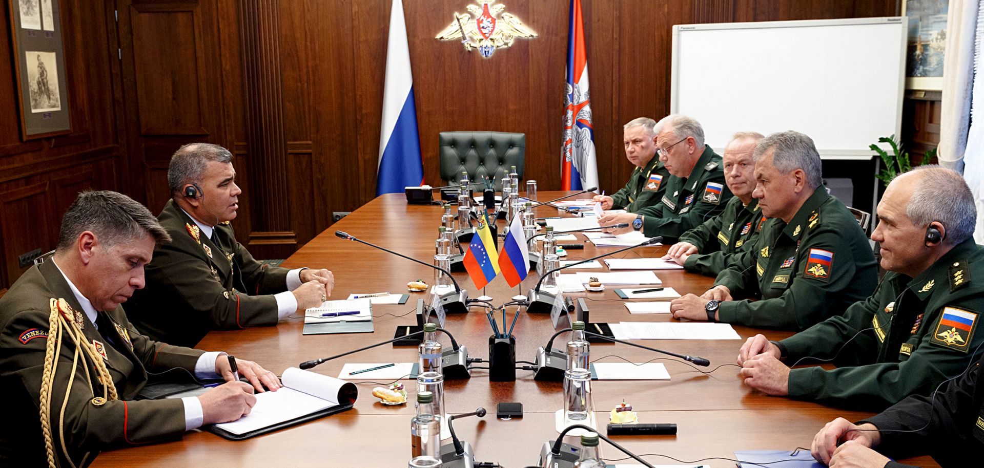 Russian Defense Minister Sergei Shoigu (second from right) and his Venezuelan counterpart, Vladimir Padrino Lopez (second from left), hold a meeting in Moscow. 