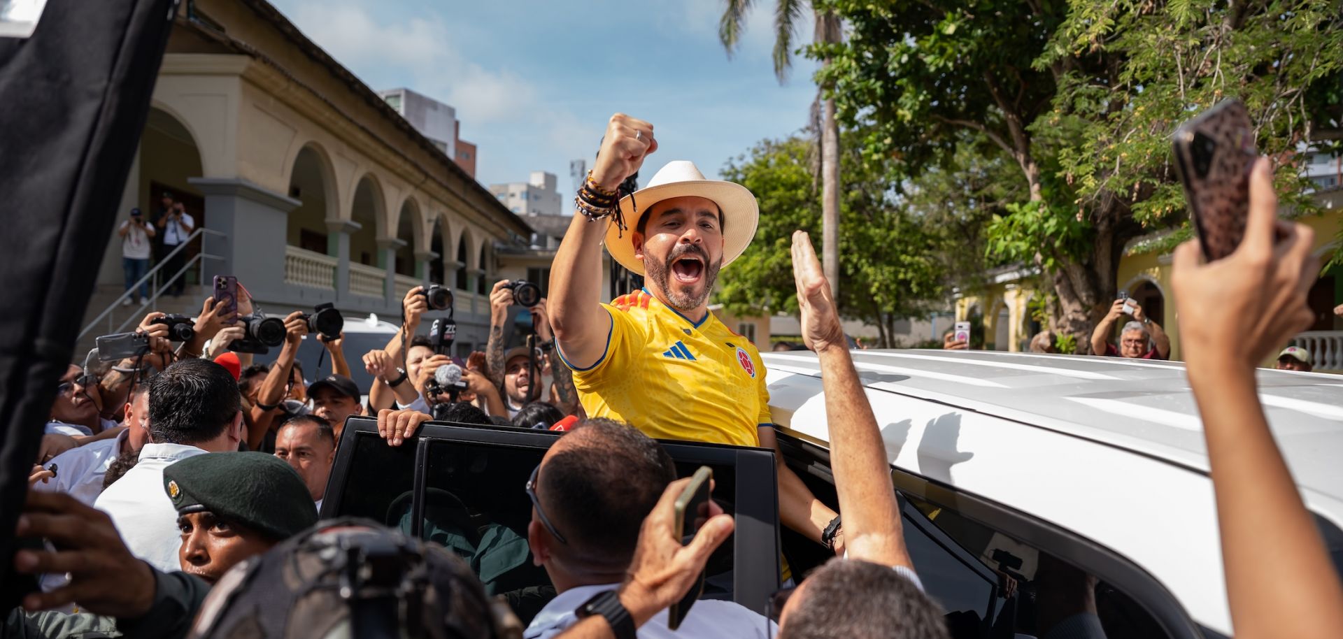 Abelardo de la Espriella, who has since been declared president-elect, waves to supporters after casting his vote during the runoff election on June 21, 2026, in Barranquilla, Colombia.