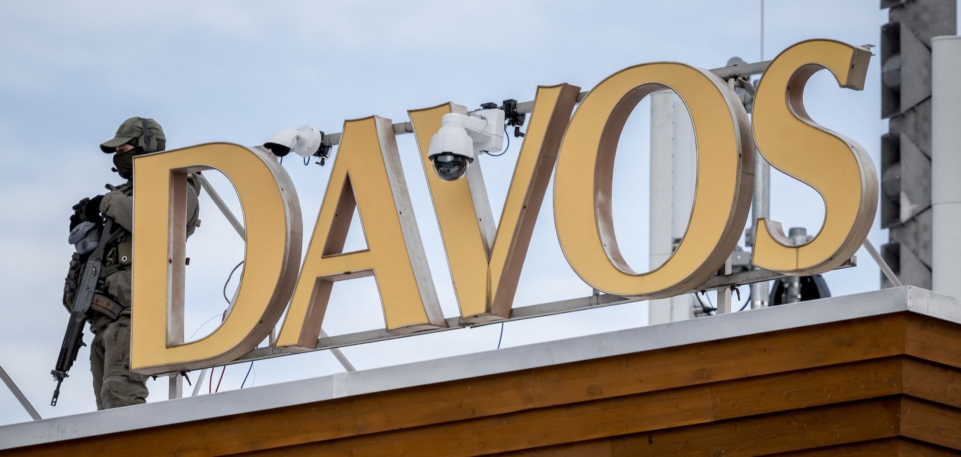 A sniper police officer on the Congress hotel during the annual meeting of the World Economic Forum on Jan. 24, 2025, in the Alpine resort of Davos, Switzerland.