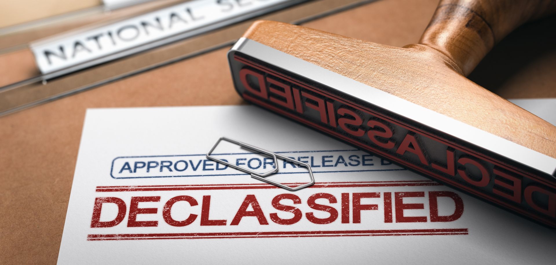 3D illustration of two folders and a rubber stamp with the word "declassified" printed on a document.