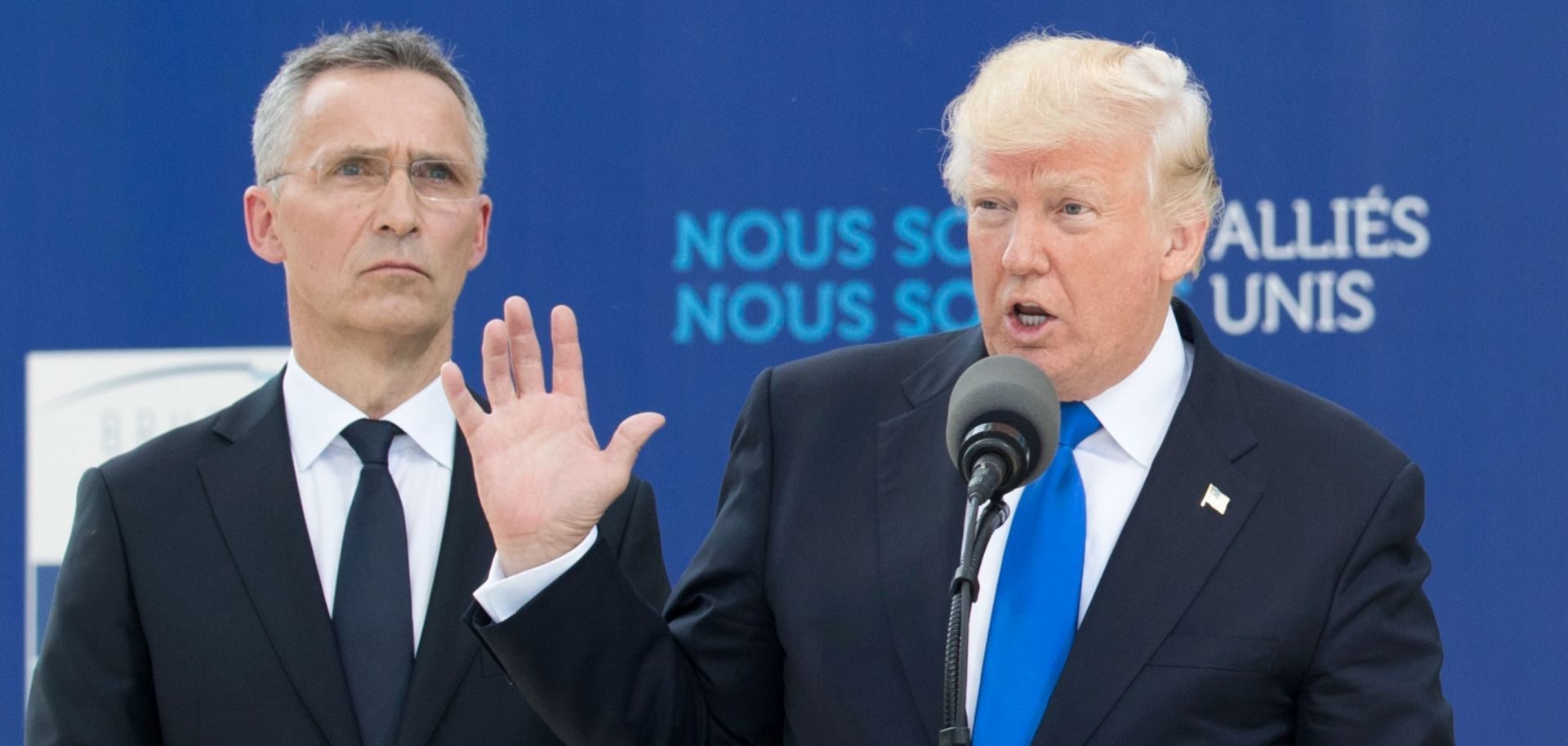 U.S. President Donald Trump and NATO Secretary-General Jens Stoltenberg speak May 25, 2017, at NATO headquarters in Brussels.