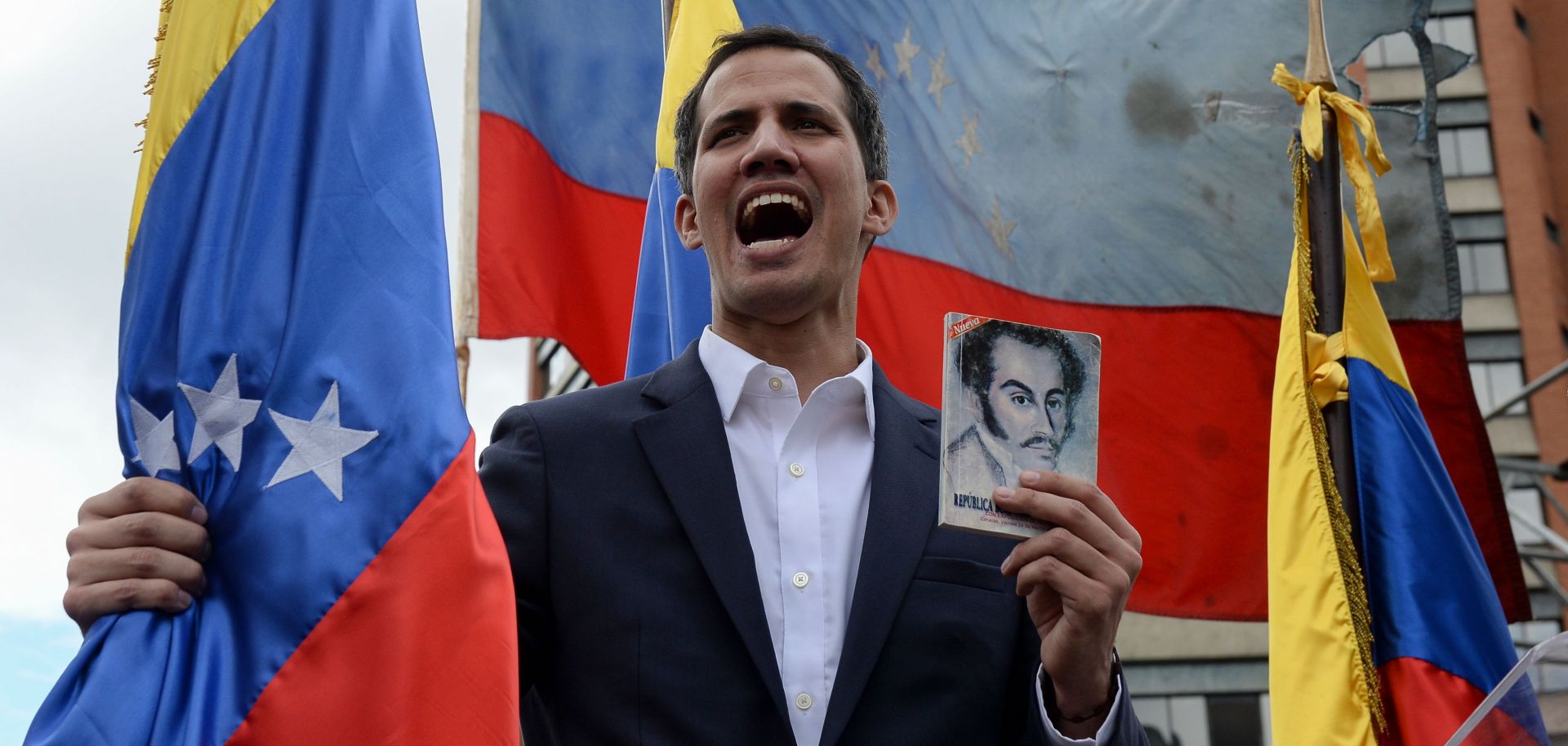 Juan Guaido, leader of Venezuela's opposition-controlled National Assembly, declares himself interim president during a rally in Caracas against President Nicolas Maduro on Jan. 23, 2019.