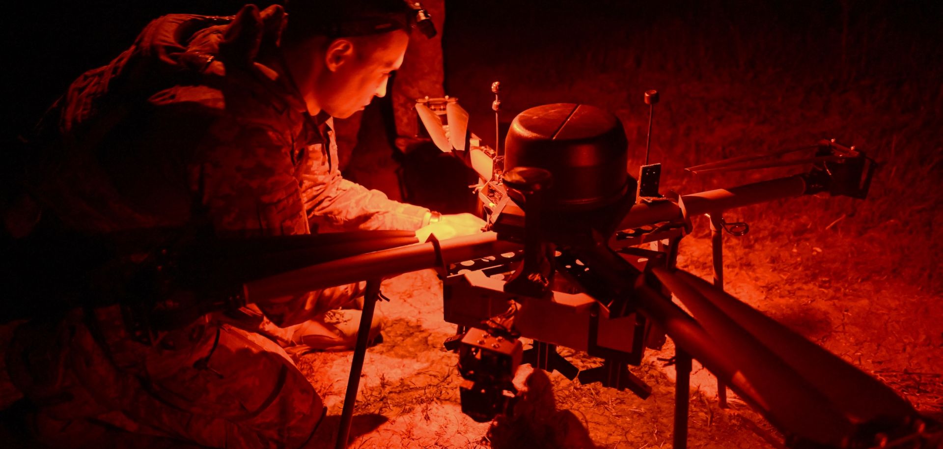 A Ukrainian serviceman from the 24th mechanized brigade prepares a Magura night drone to flight toward the front line in the area of Chasiv Yar, Donetsk region late on April 29, 2025.