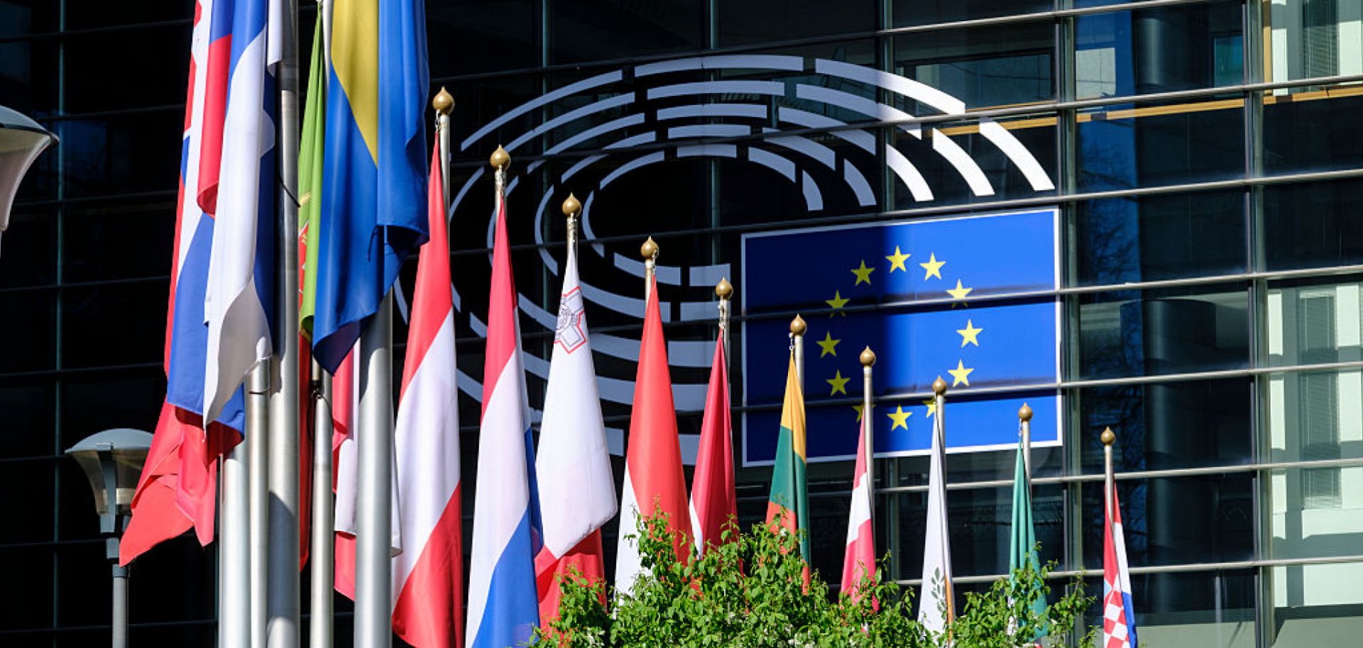 Flags of EU countries are seen outside the European Parliament building in Brussels, Belgium, on April 5, 2025.