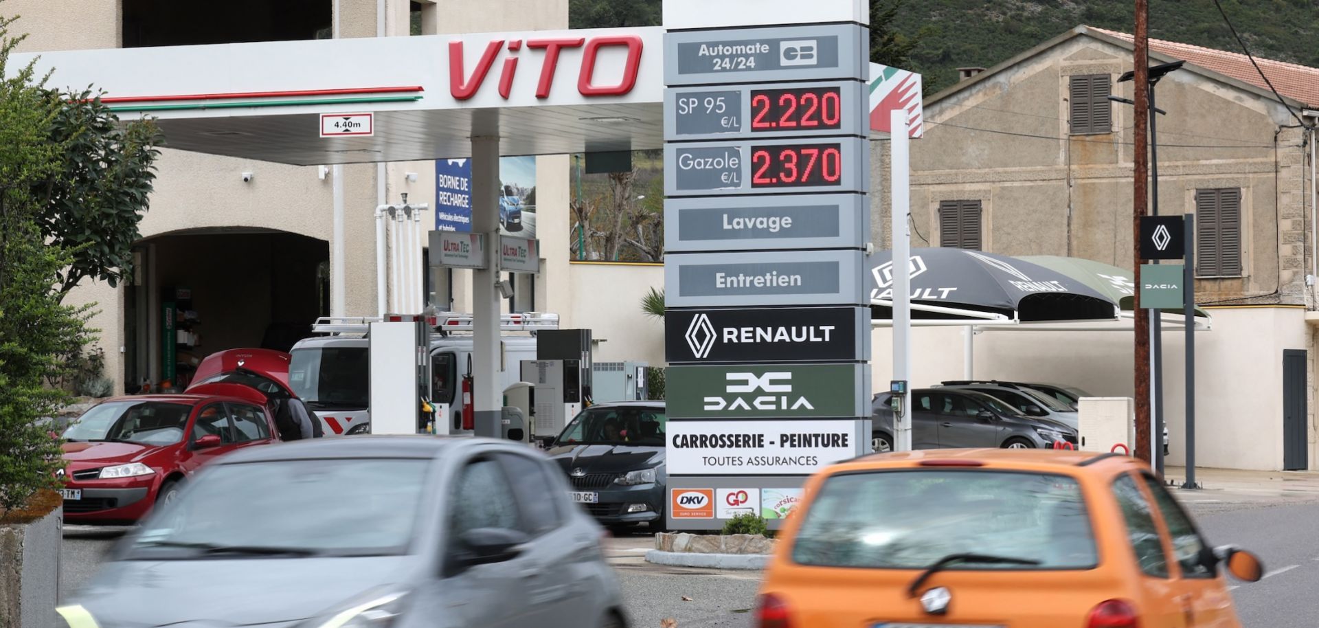 Cars drive past a gas station in Ponte Leccia on the French Mediterranean island of Corsica on March 26, 2026. 