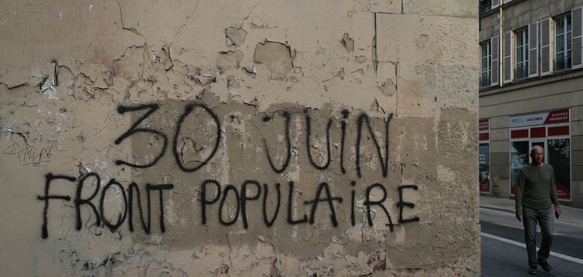 Graffiti reading 'June 30 Popular Front' after the results of the first round of parliamentary elections were announced June 30 in Paris.