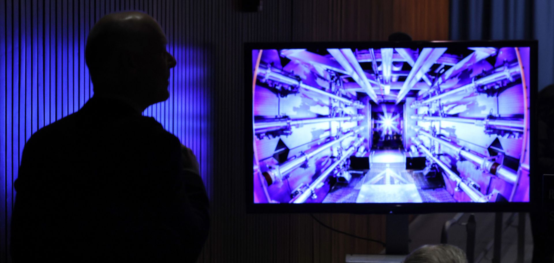 Guests await the beginning of a news conference with U.S. Energy Secretary Jennifer Granholm at the Department of Energy headquarters to announce a breakthrough in fusion research on Dec. 13, 2022, in Washington, D.C. 