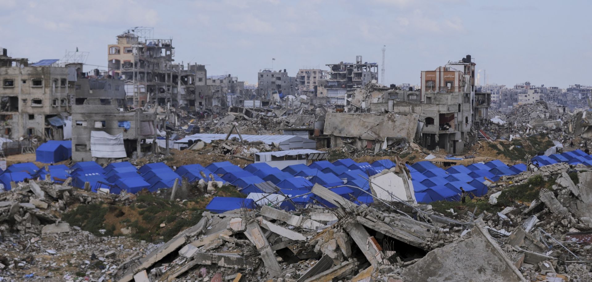 Damage on Feb. 13 in the Jabaliya refugee camp in northern Gaza. The sixth hostage-prisoner exchange between Israel and Hamas will likely occur Feb. 15 after Hamas backtracked on its Feb. 10 decision to delay it.