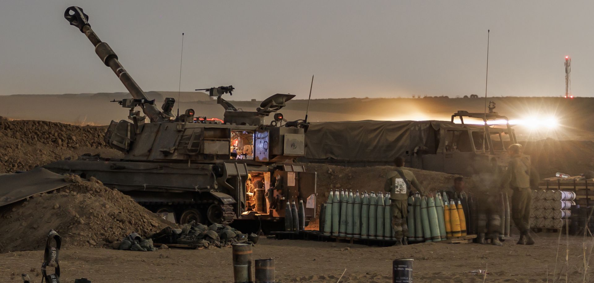 Israeli forces prepare to fire artillery toward the Gaza Strip on Oct. 30, 2023, in Netivot, Israel. 