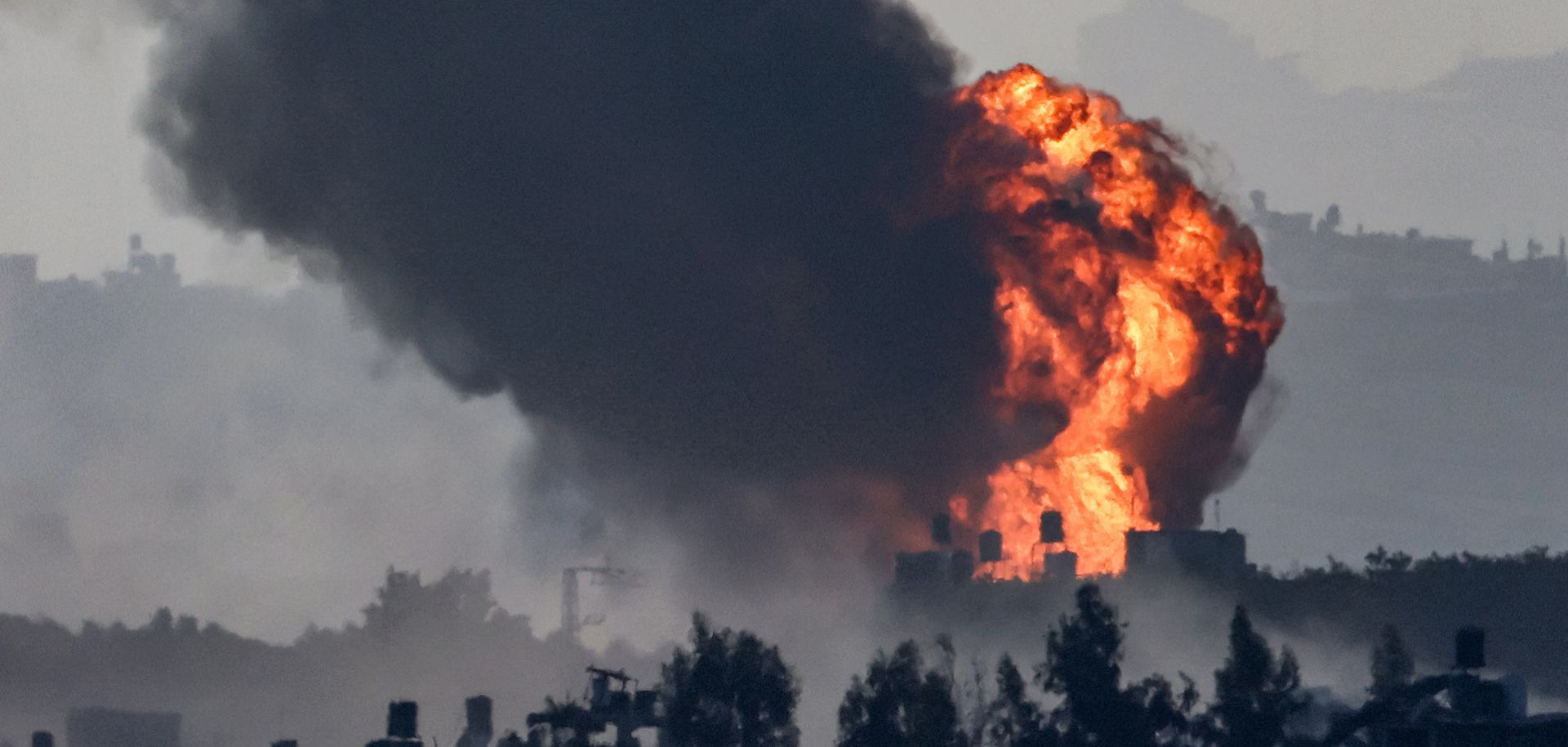 A fireball erupts over the Gaza Strip during Israeli bombardment on Nov. 8, 2023. 