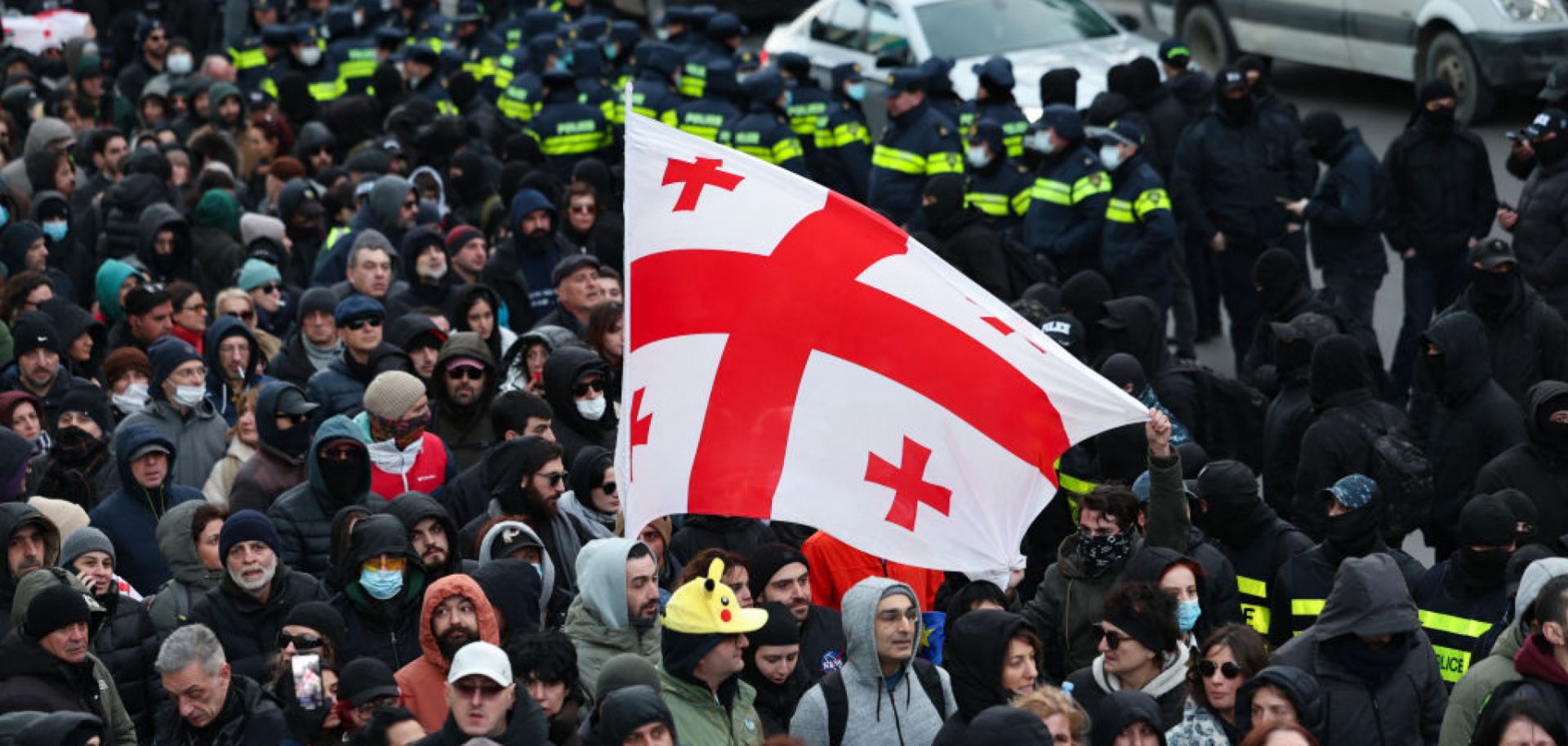 Georgian anti-government demonstrators attempt to block a highway entrance to the capital Tbilisi on Feb. 2, 2025