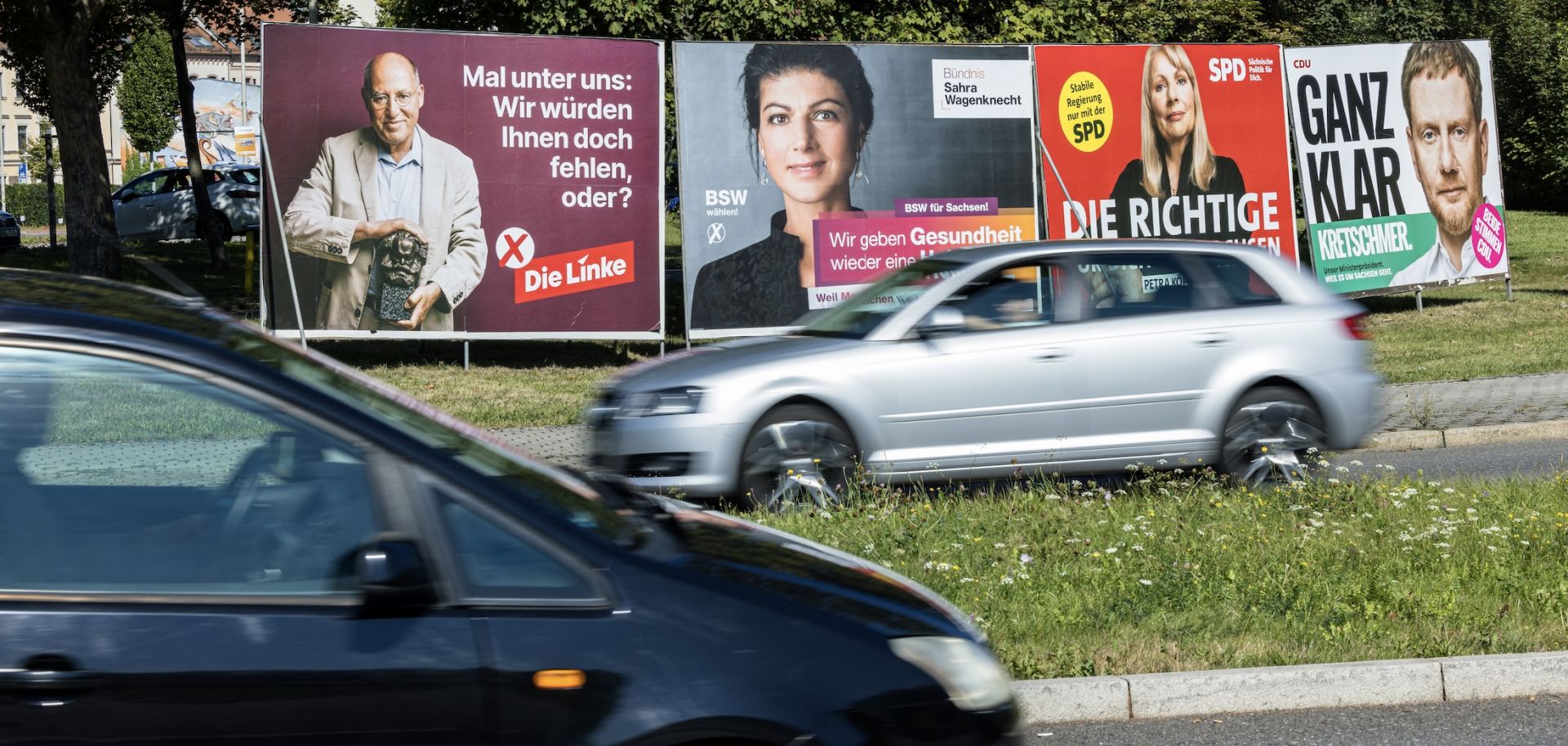 Cars drive past election campaign posters in the German city of Zwickau, located in the eastern state of Saxony, on Aug. 20, 2024, ahead of Saxony's Sept. 1 state election. 