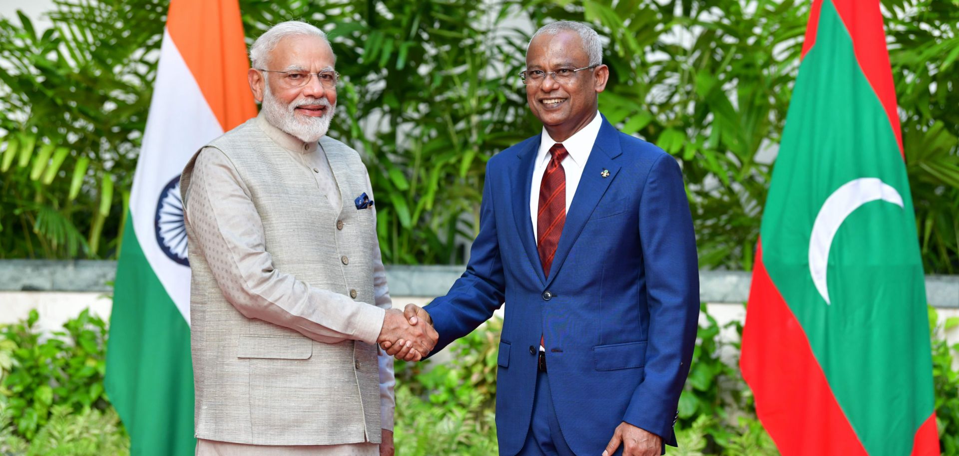 Indian Prime Minister Narendra Modi (left) shakes hands with Maldivian President Ibrahim Mohamed Solih in Male during a visit to the island nation on June 8, 2019.