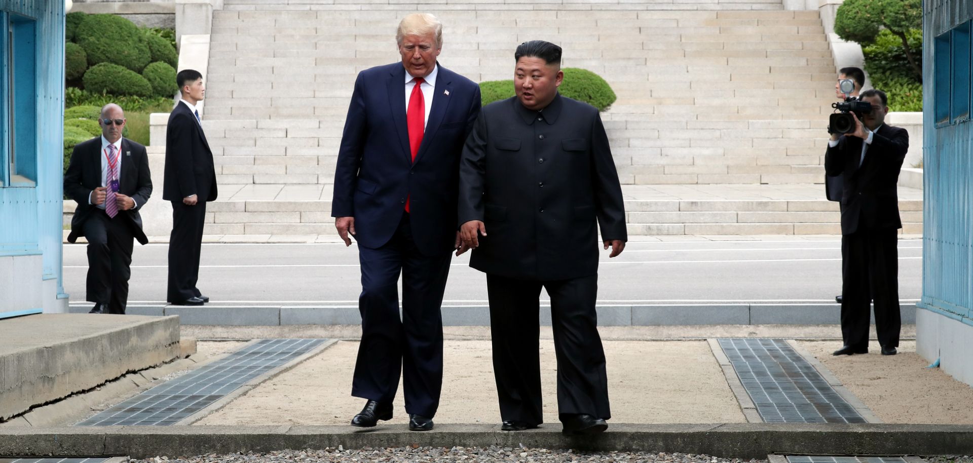 U.S. President Donald Trump and North Korean leader Kim Jong Un meet at the border village of Panmunjom in the Demilitarized Zone separating South and North Korea on June 30, 2019.