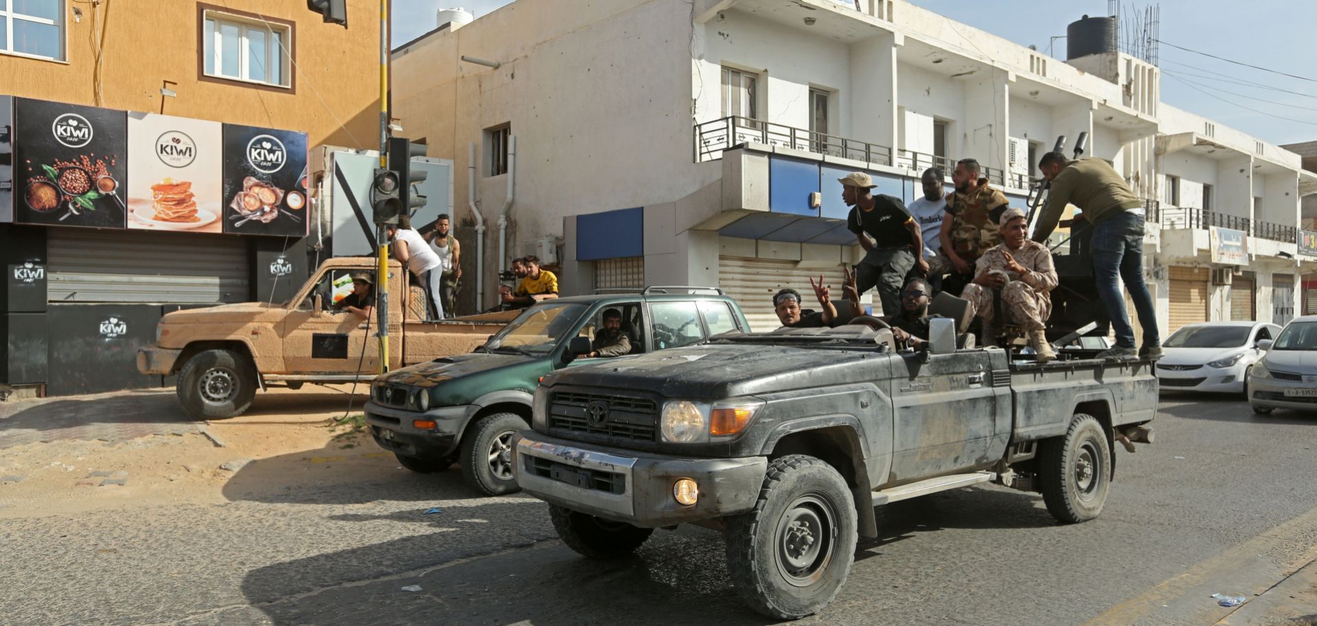 Fighters loyal to the U.N.-recognized Government of National Accord (GNA) celebrate in Sabratha, Libya, after seizing the coastal city from Khalifa Hifter’s rebel troops on April 13, 2020. 