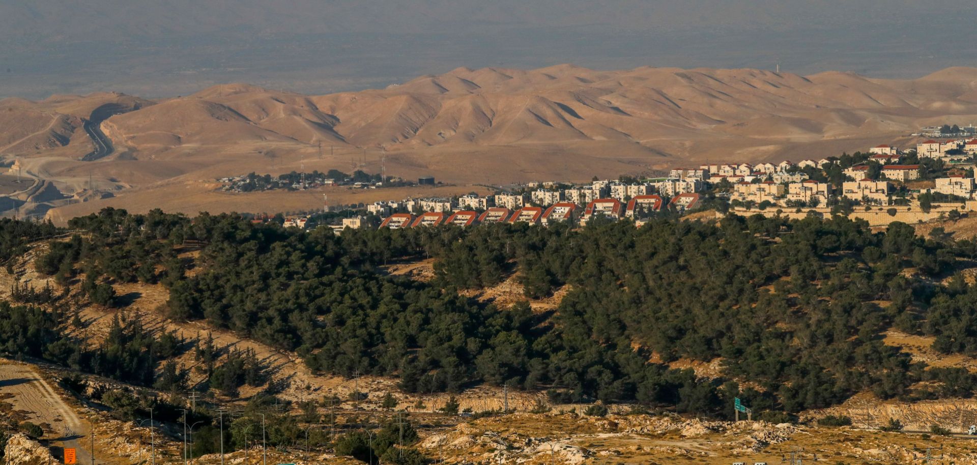 The Israeli settlement of Ma'ale Adumim is seen in the background of the photo of the West Bank’s E1 corridor taken on June 30, 2020. 