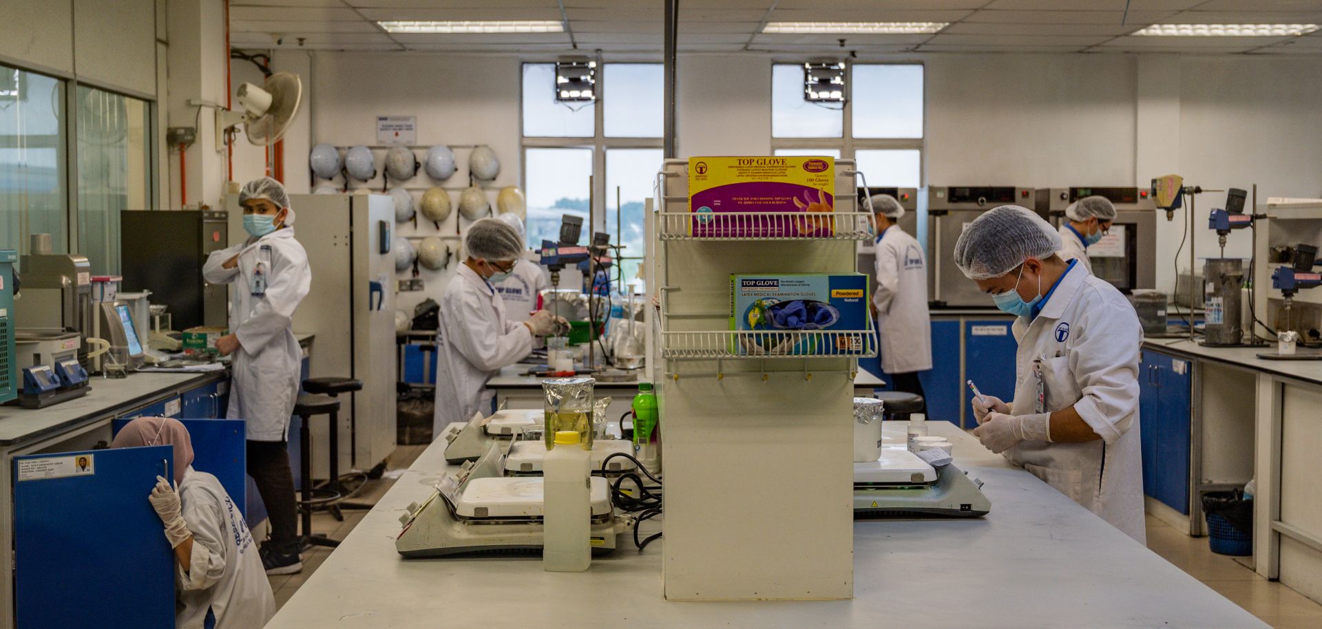 Staff conduct research for Top Glove, one of the world's largest rubber glove manufacturers, in a factory located near Kuala Lumpur, Malaysia, on Aug. 26, 2020.