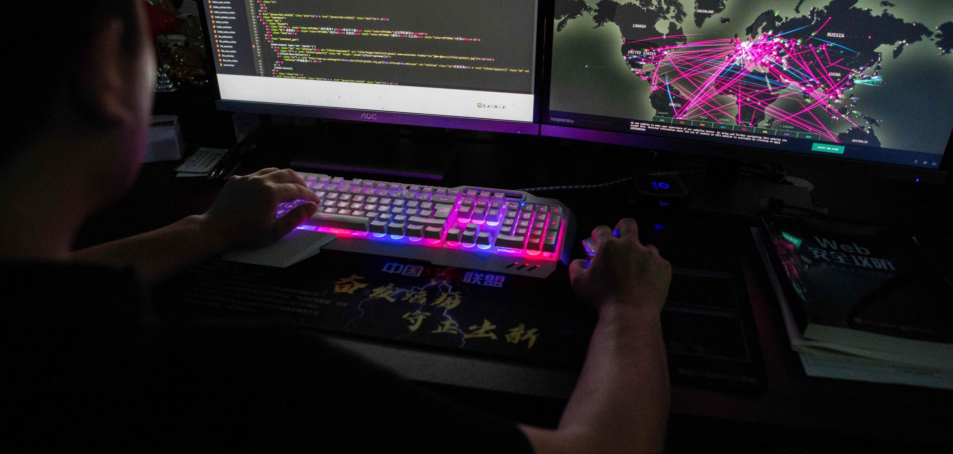 A member of the hacking group Red Hacker uses a website that monitors global cyberattacks in Dongguan, China, on Aug. 4, 2020.