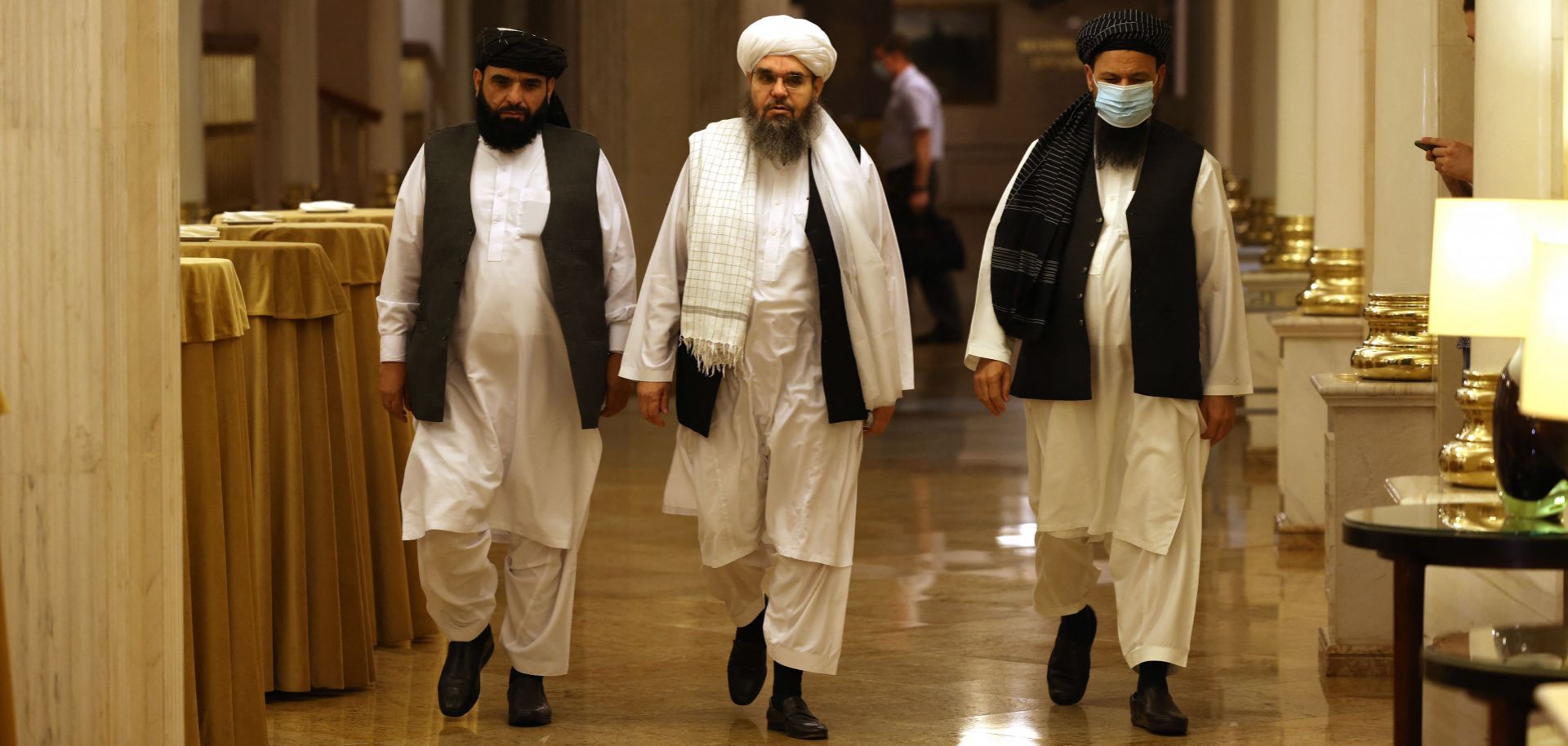 Leaders of the Taliban walk to attend a press conference in Moscow, Russia, on July 9, 2021. 