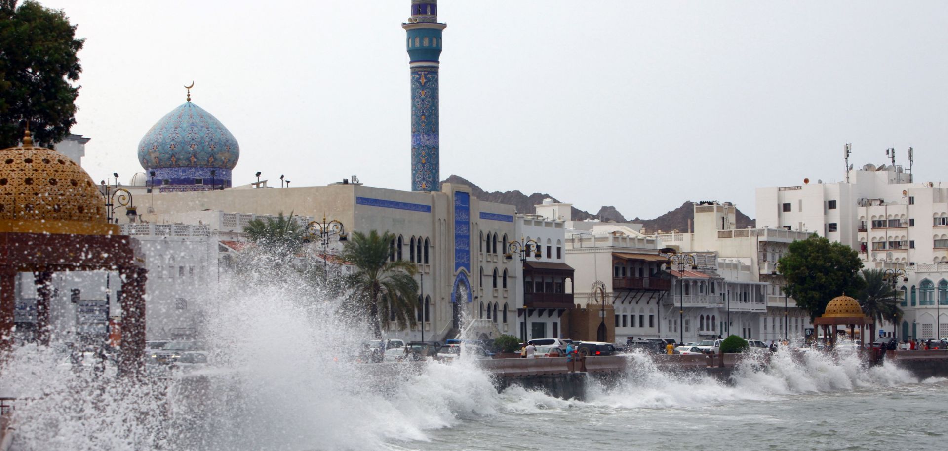 High waves break on the seaside promenade in Muscat on Oct. 2, 2021, the day before Cyclone Shaheen officially made landfall in Oman. 