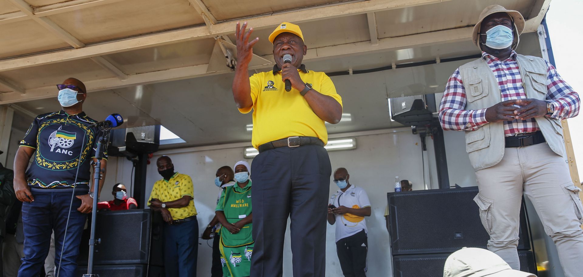 South African President Cyril Ramaphosa (center) addresses supporters of his African National Congress (ANC) party during a rally ahead of local government elections in a township north of Pretoria on Oct. 15, 2021. 