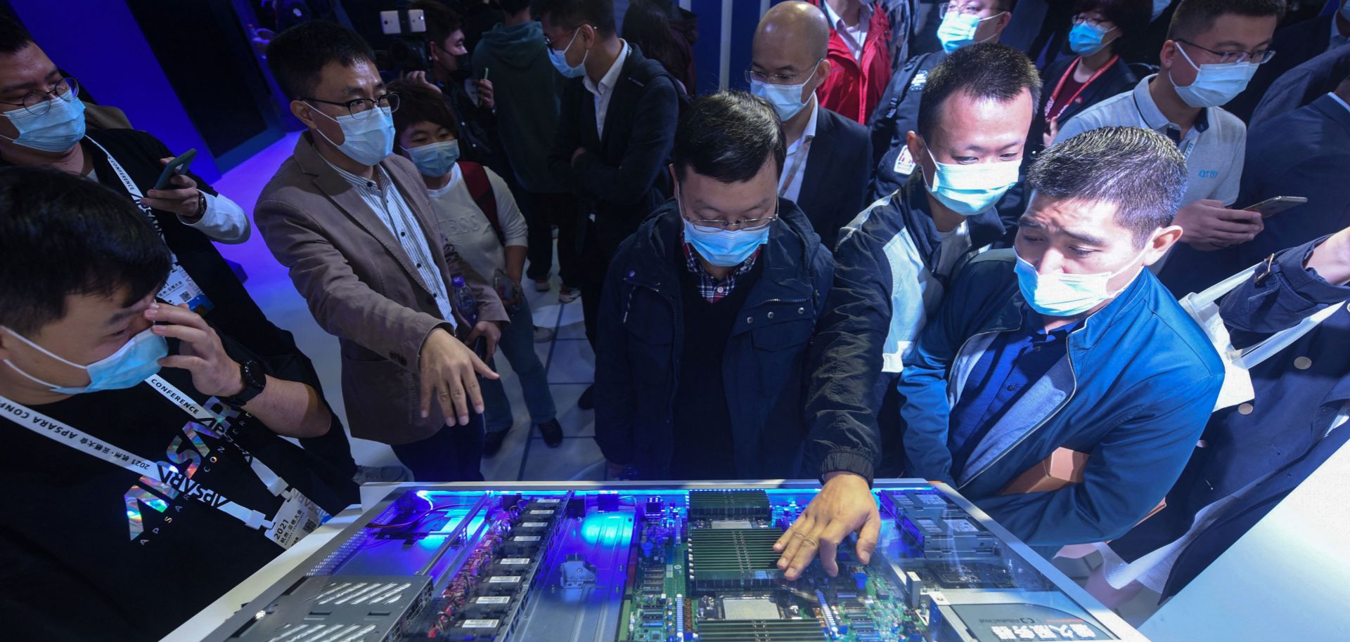 Visitors look at Alibaba's new servers at the company's annual cloud computing conference in Hangzhou, China, on Oct. 19, 2021. 