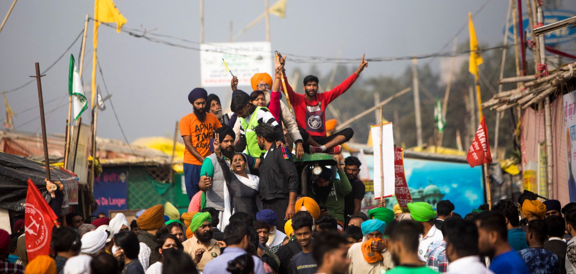 Farmers in India celebrate on Nov. 19, 2021, after the government announced it was repealing the controversial agricultural reforms that sparked nearly a year of protests in the country.