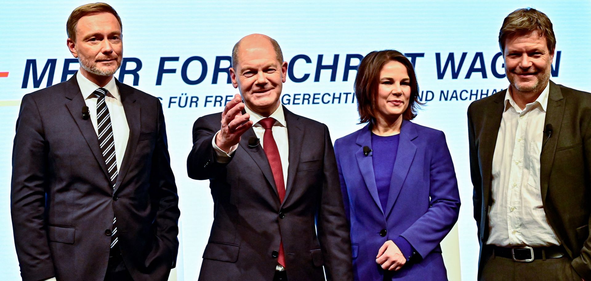 FDP leader Christian Lindner, SPD leader Olaf Scholz and the co-leaders of Germany's Greens party Annalena Baerbock and Robert Habeck (left to right) pose during a press conference in Berlin after presenting their coalition agreement on Nov. 24, 2021. 
