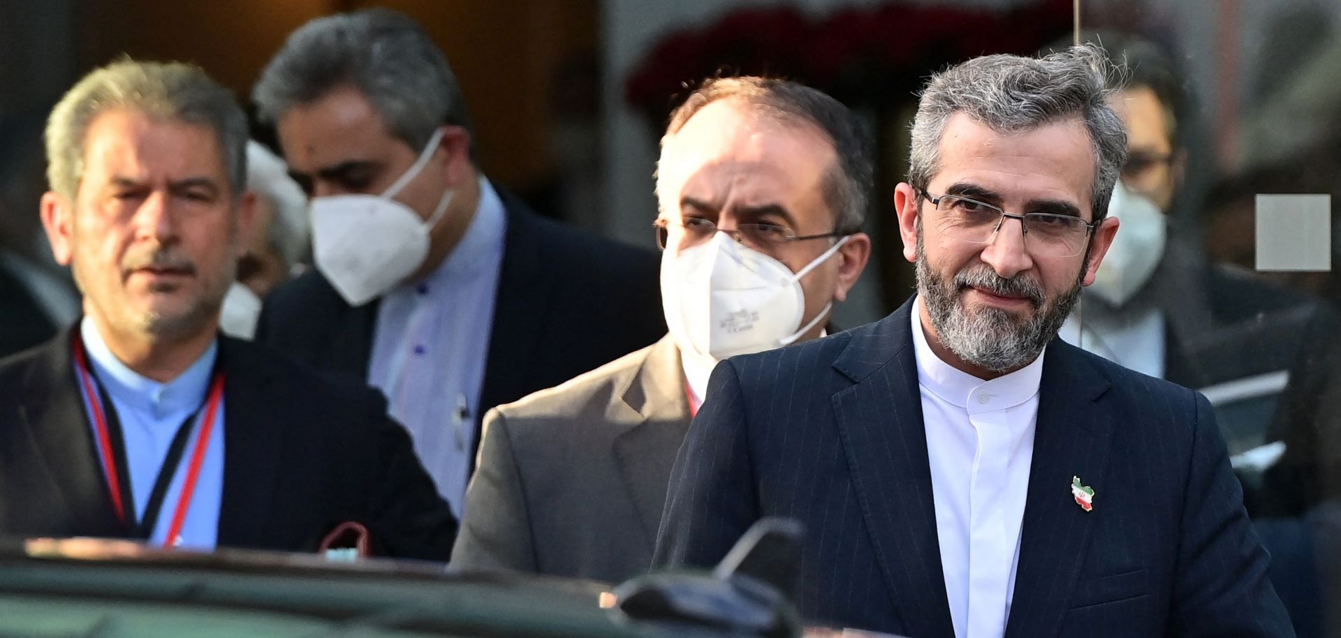 Iran's chief nuclear negotiator Ali Bagheri Kani (right) and members of his delegation are seen leaving the venue of the Joint Comprehensive Plan of Action (JCPOA) talks in Vienna, Austria, on Dec. 3, 2021. 