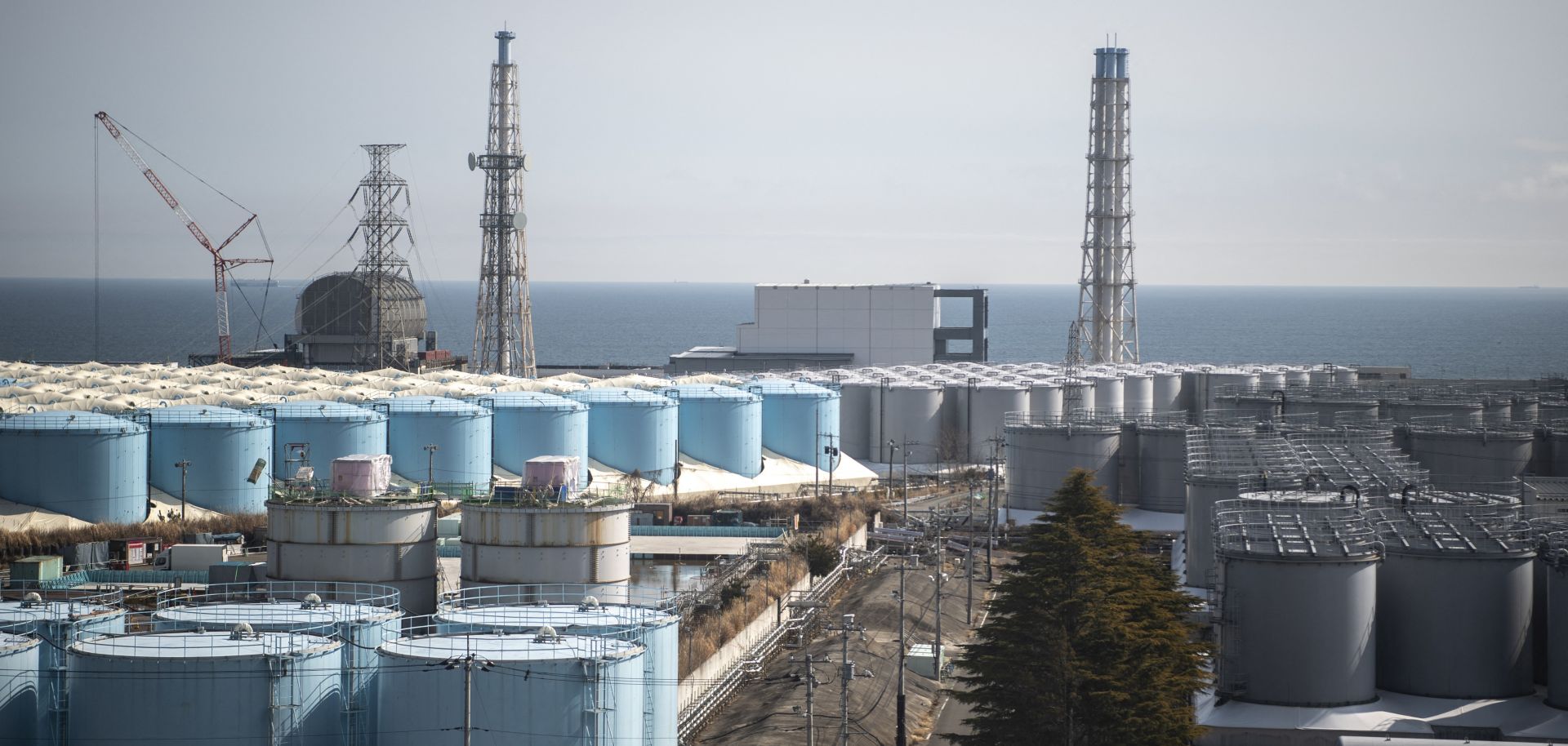 Reactor buildings and water storage tanks are seen at the Fukushima Daiichi nuclear power plant in Okuma, Japan, on March 5, 2022 -- nearly 11 years after a massive earthquake triggered a devastating meltdown.