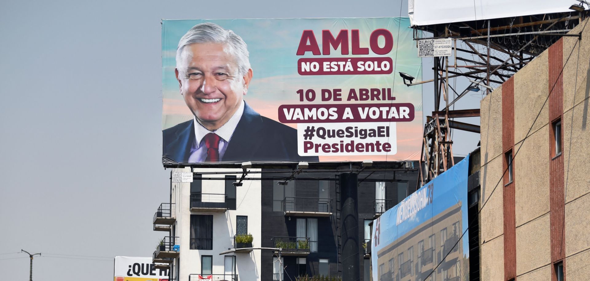 A billboard in Mexico City encourages voters to support Mexican President Andres Manuel Lopez Obrador in the recall referendum scheduled for April 10, 2022. 