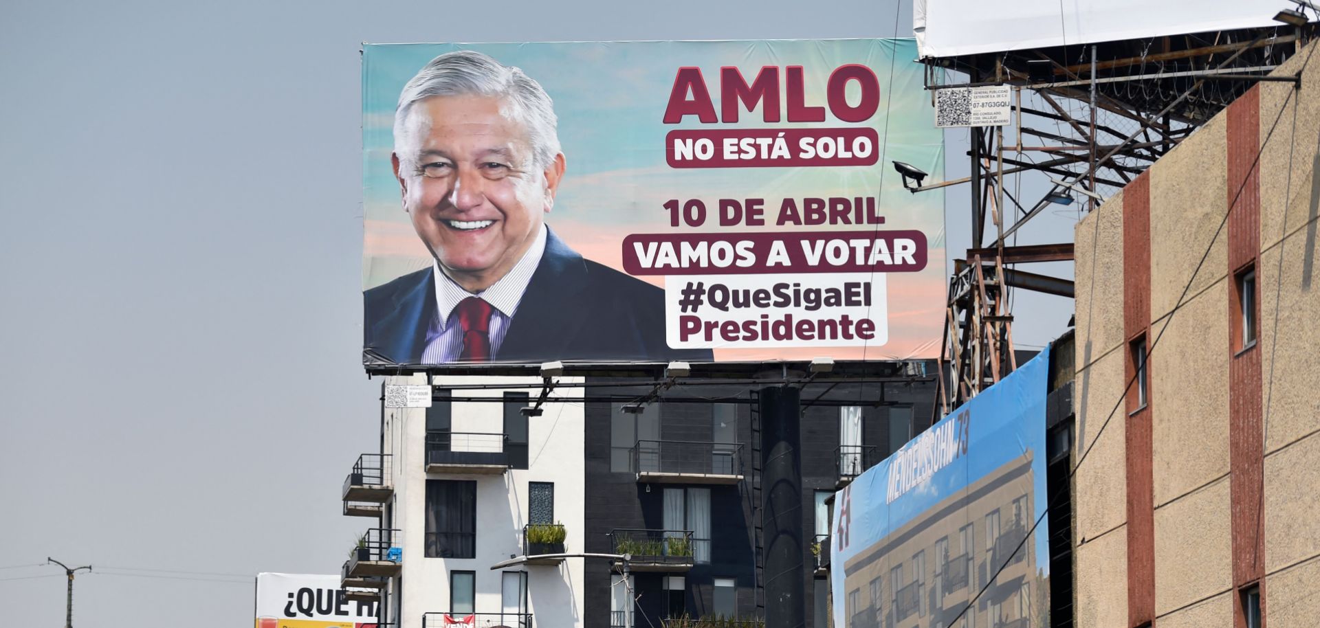 A billboard in Mexico City encourages voters to support Mexican President Andres Manuel Lopez Obrador in the recall referendum scheduled for April 10, 2022.