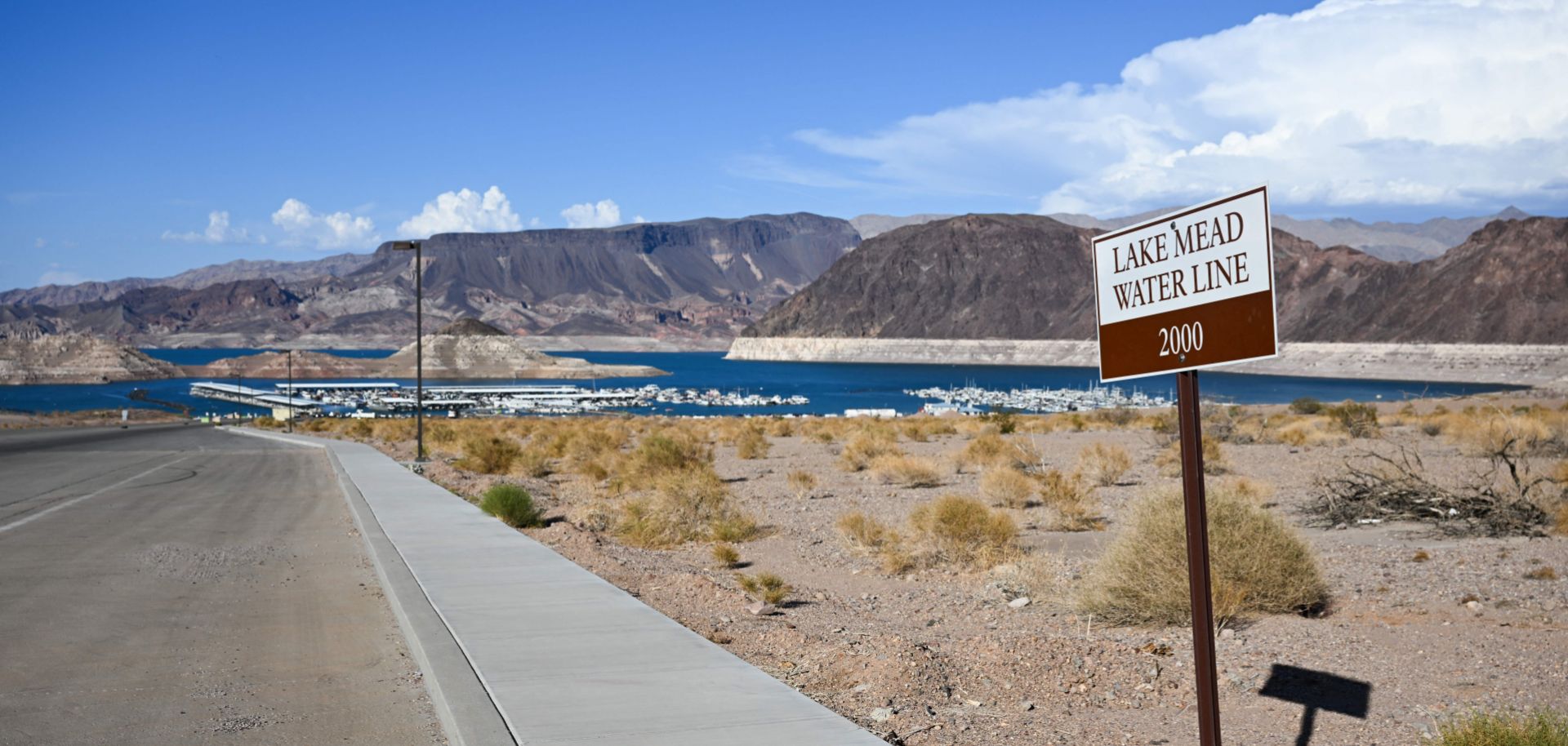 A photo taken on June 28, 2022, at Lake Mead along the Colorado River in Boulder City, Nevada, shows the lake's water line in 2000 in contrast to its current low water levels. 