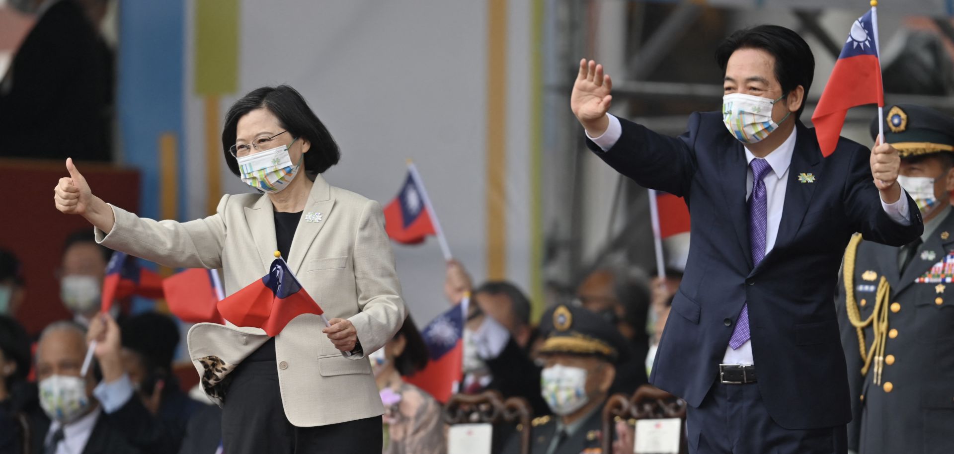 Taiwanese President Tsai Ing-wen (left) and Vice President William Lai attend a ceremony to mark the island's National Day in front of the Presidential Office in Taipei on Oct. 10, 2022. 