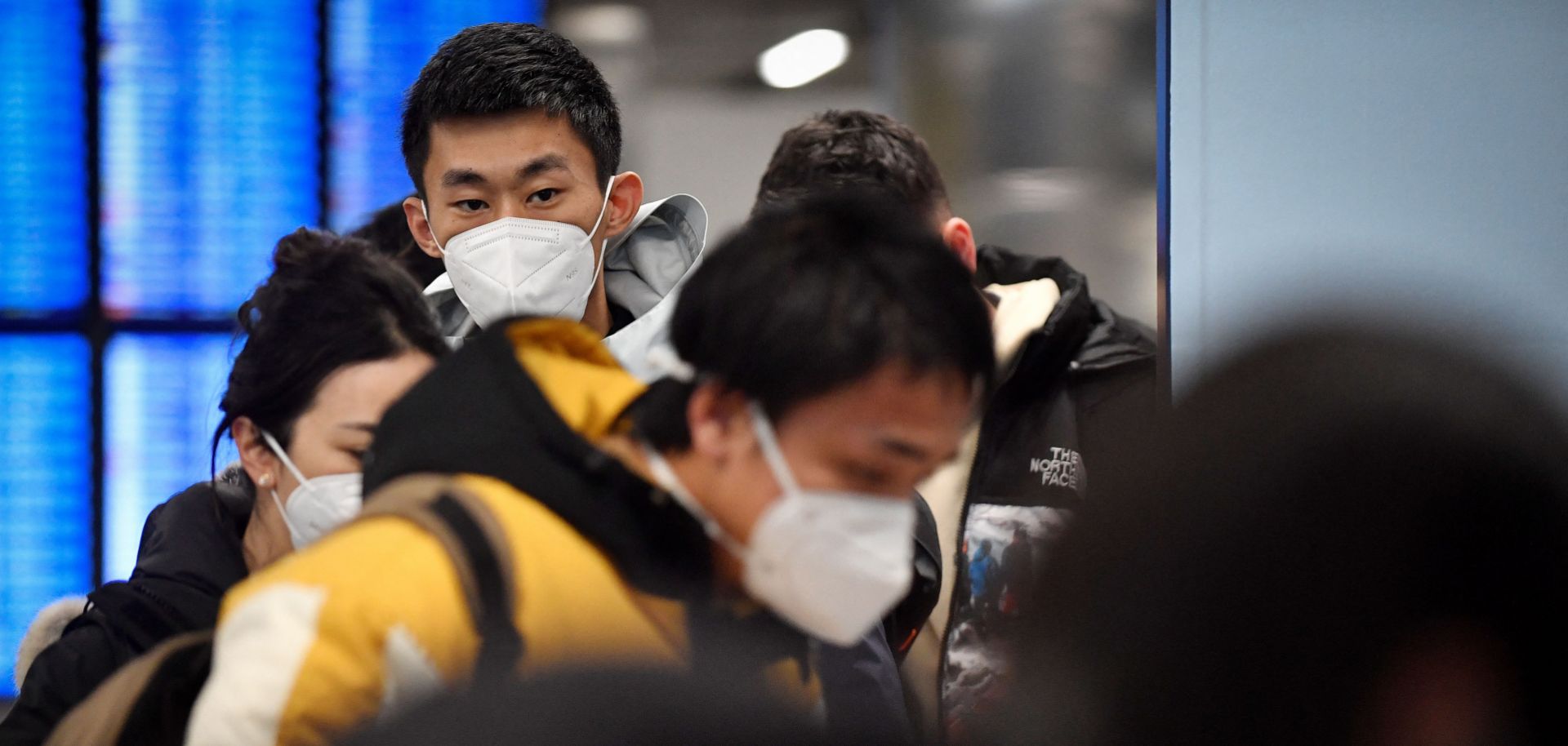 Passengers of a flight from China walk toward a COVID-19 testing center after arriving in Paris, France, on Jan. 1, 2023.