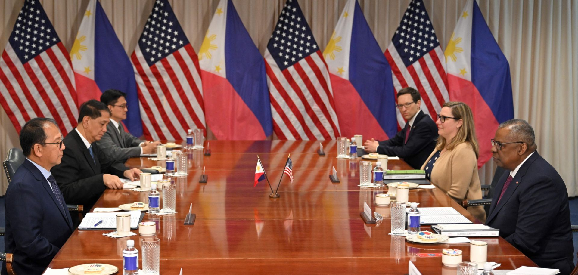 U.S. Defense Secretary Lloyd Austin (right) meets with his Philippine counterpart, Carlito Galvez (left), at the Pentagon in Washington, D.C., on April 12, 2023.