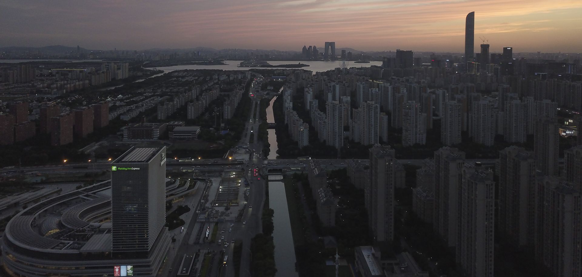 A photo taken on May 31, 2021, shows the skyline of Suzhou, China, at sunset.