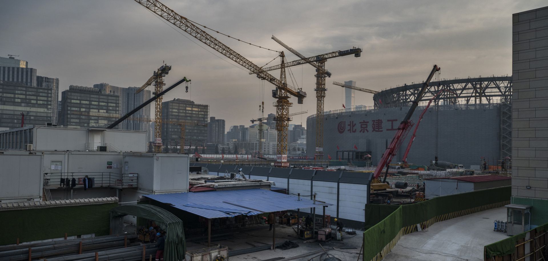 A photo shows the construction site of a new stadium project being built in Beijing, China, on Dec. 15, 2021. 