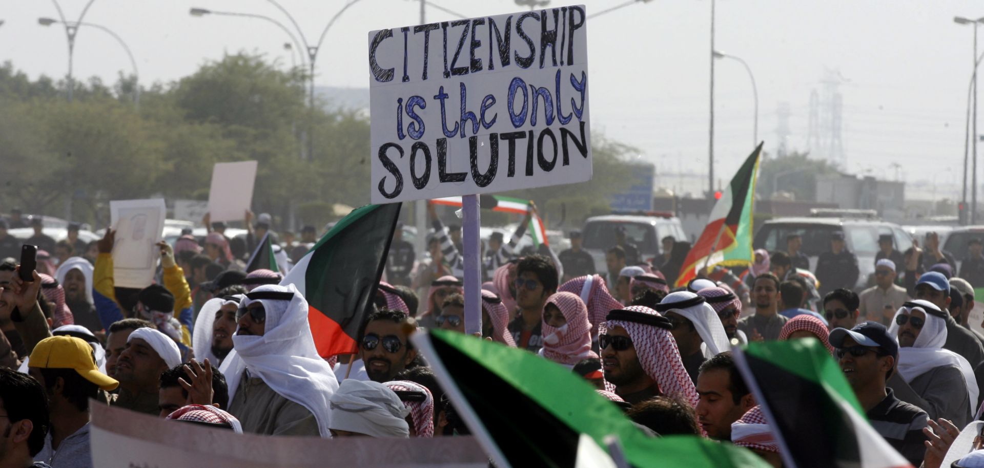 Members of Kuwait’s stateless Bidoon community protest to demand citizenship and other rights in Jahra, northwest of Kuwait City, in December 2011. 